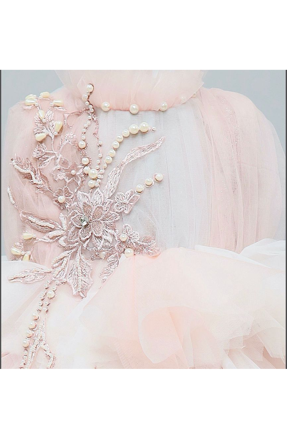Light pink and blue frilly princess gown