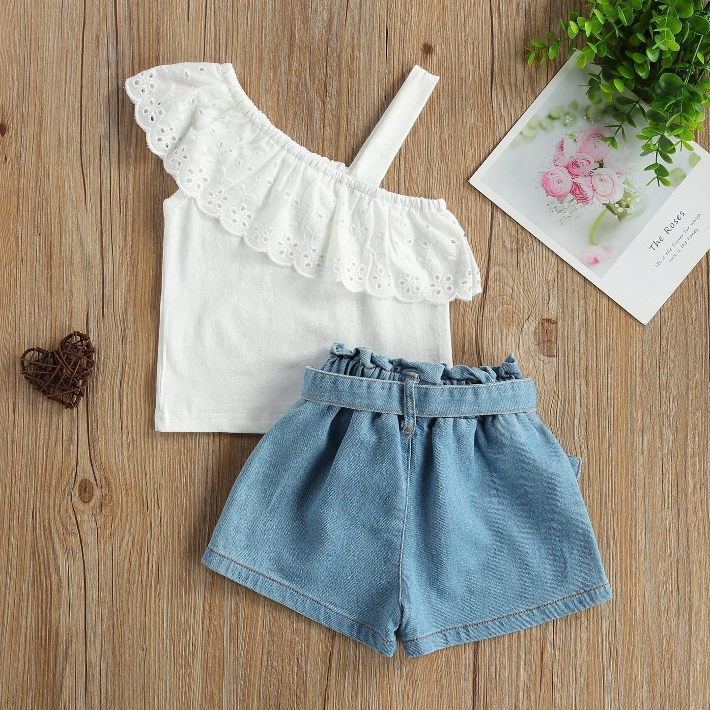 Eyelet top and buttoned denim shorts set