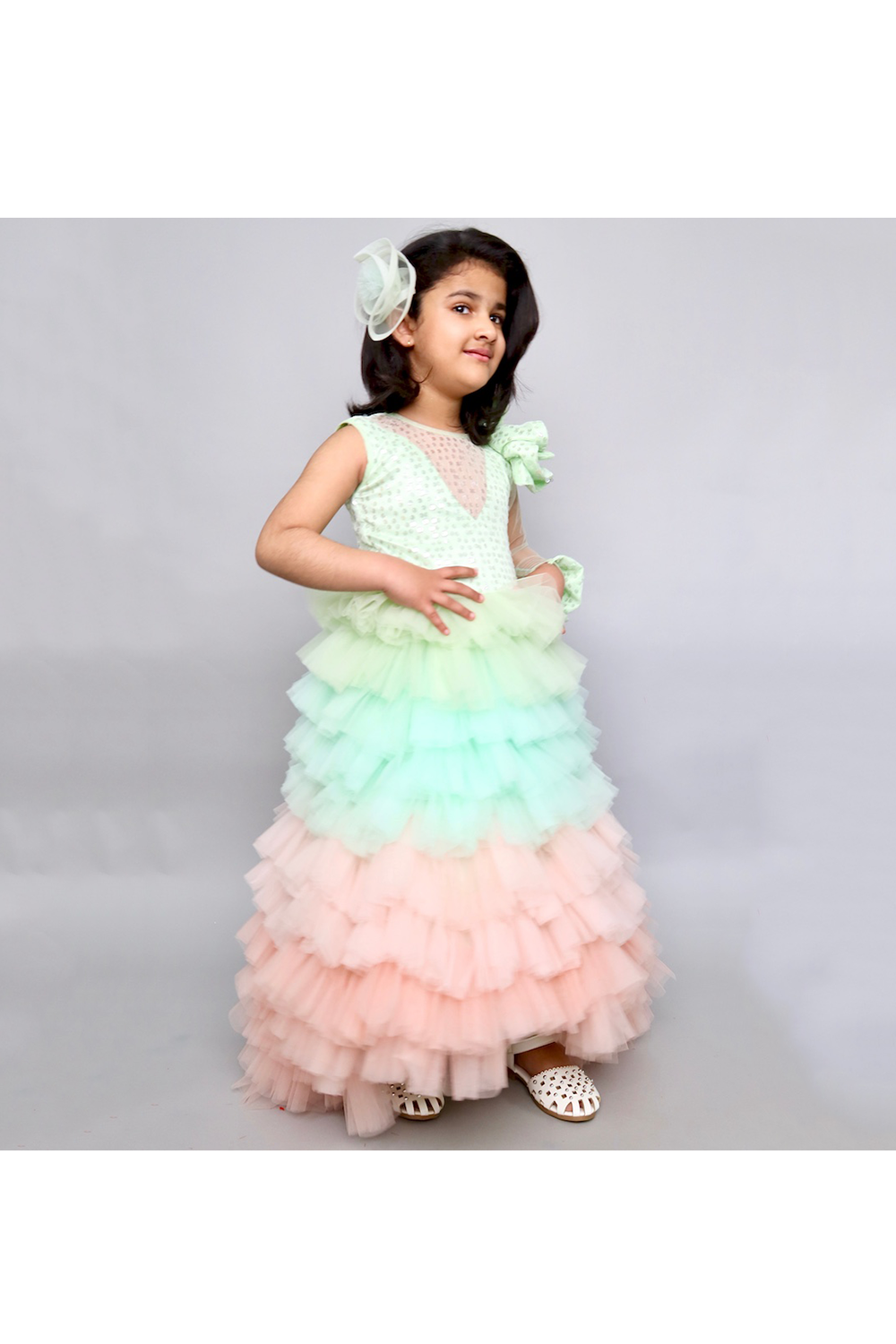 Mint green and peach sequins net ruffle styled gown