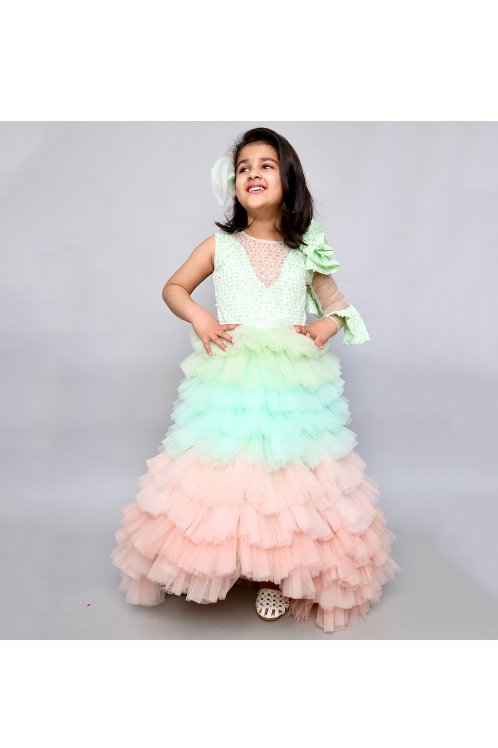 Mint green and peach sequins net ruffle styled gown