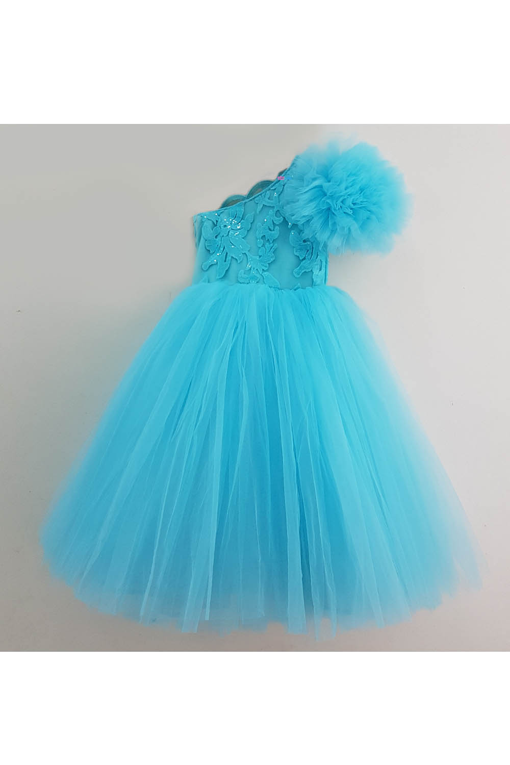 Blue one shoulder embroidered net frilly gown