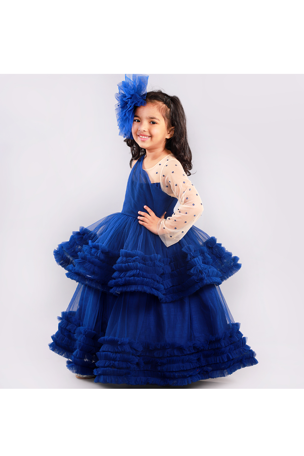 Navy blue double layered gown with a translucent sleeve