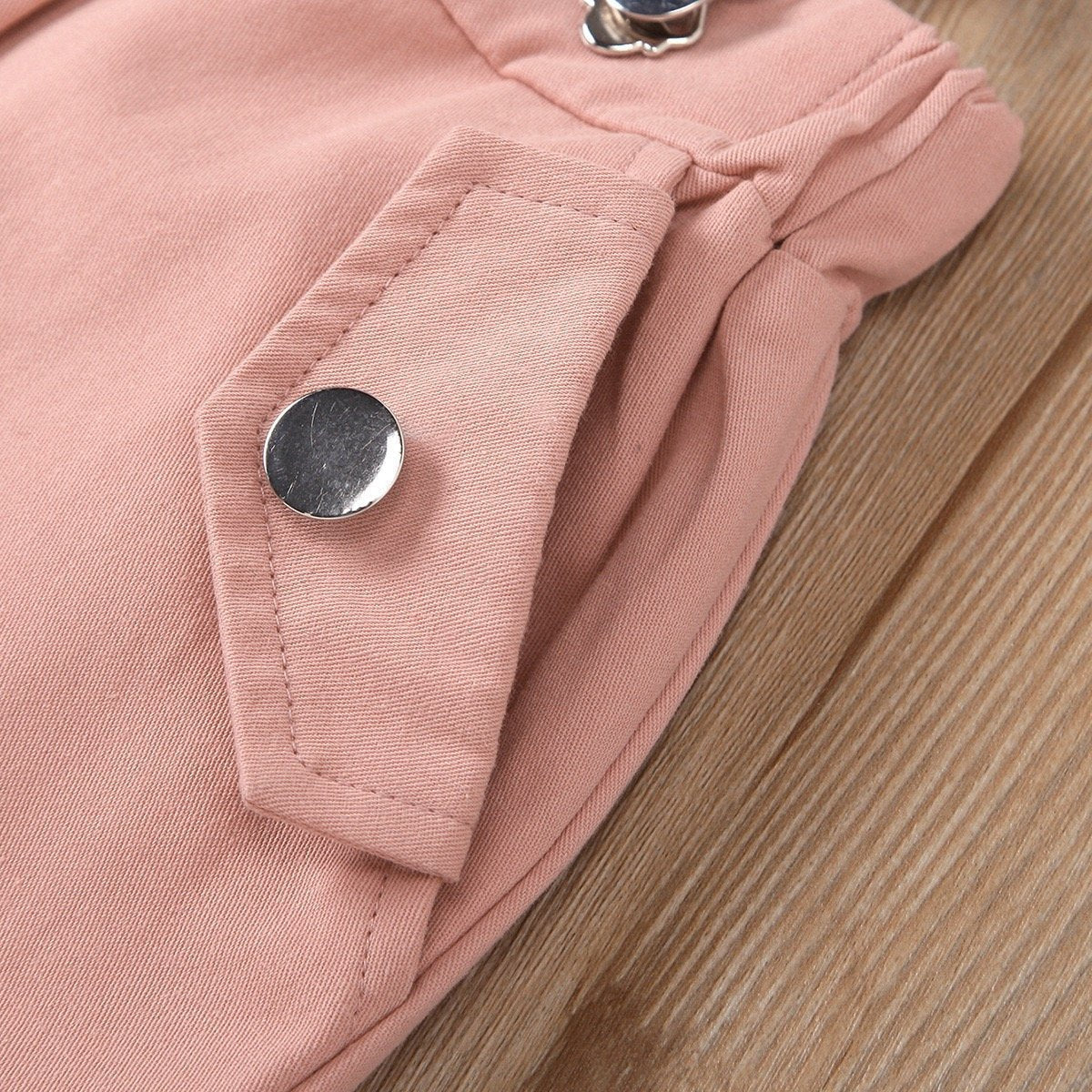 Eyelet top and dungaree shorts set