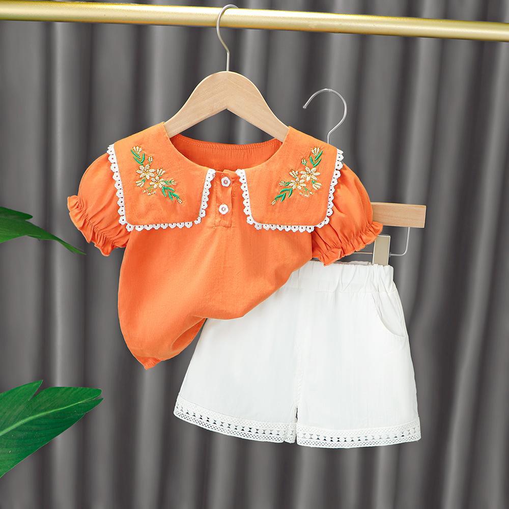 Embroidered collar top and white shorts set